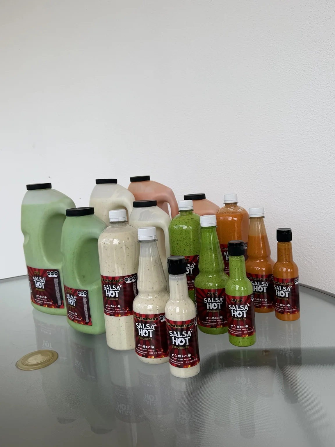 Presentaciones reales de Salsa Hot desde 175 ml hasta galón